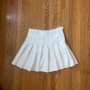 Pleated tennis skirt with built in shorts